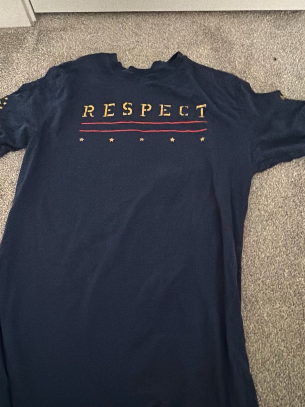 Under Armour Navy Tee with Gold and Red RESPECT Graphic
